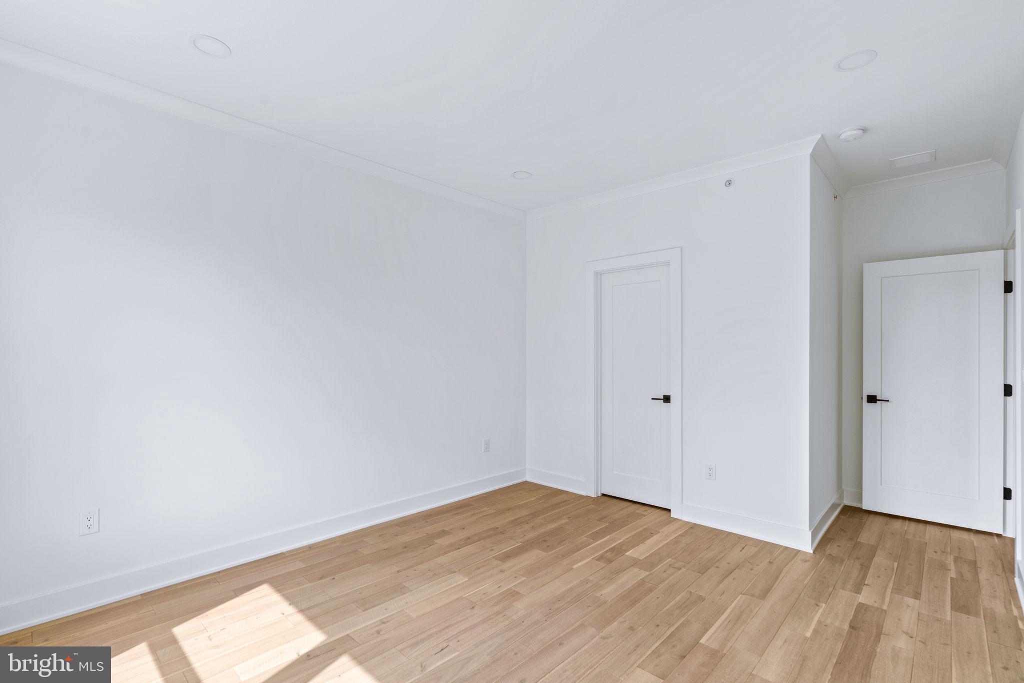 681 Provident Road Southampton, PA 18966 - Photo 24 of 33 a view of empty room with wooden floor and fan