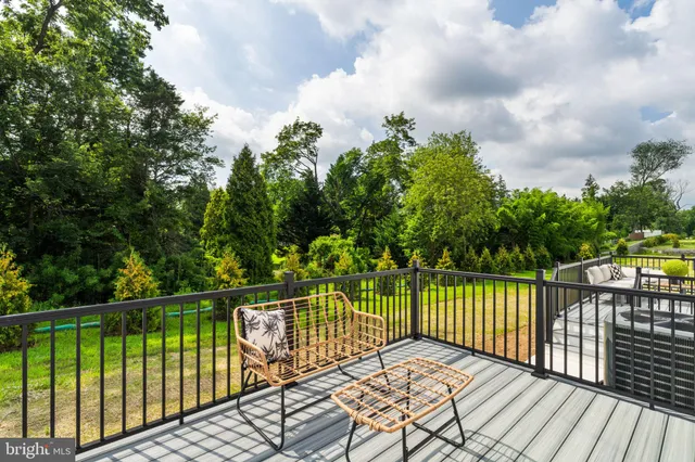 a view of a balcony with wooden floor