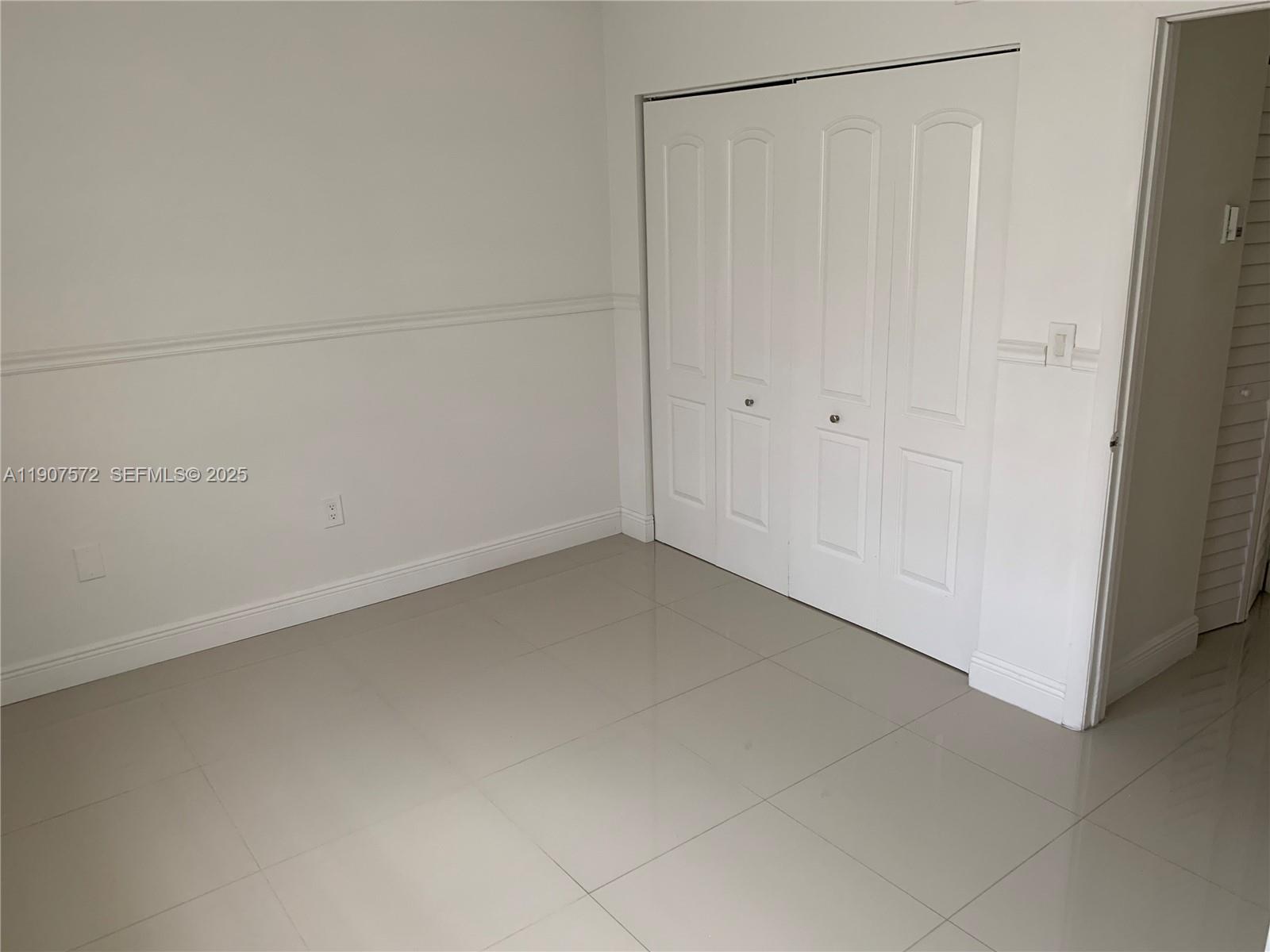 15102 Southwest 81st Street, Unit 113 Miami, FL 33193 - Photo 6 of 10 a view of a room