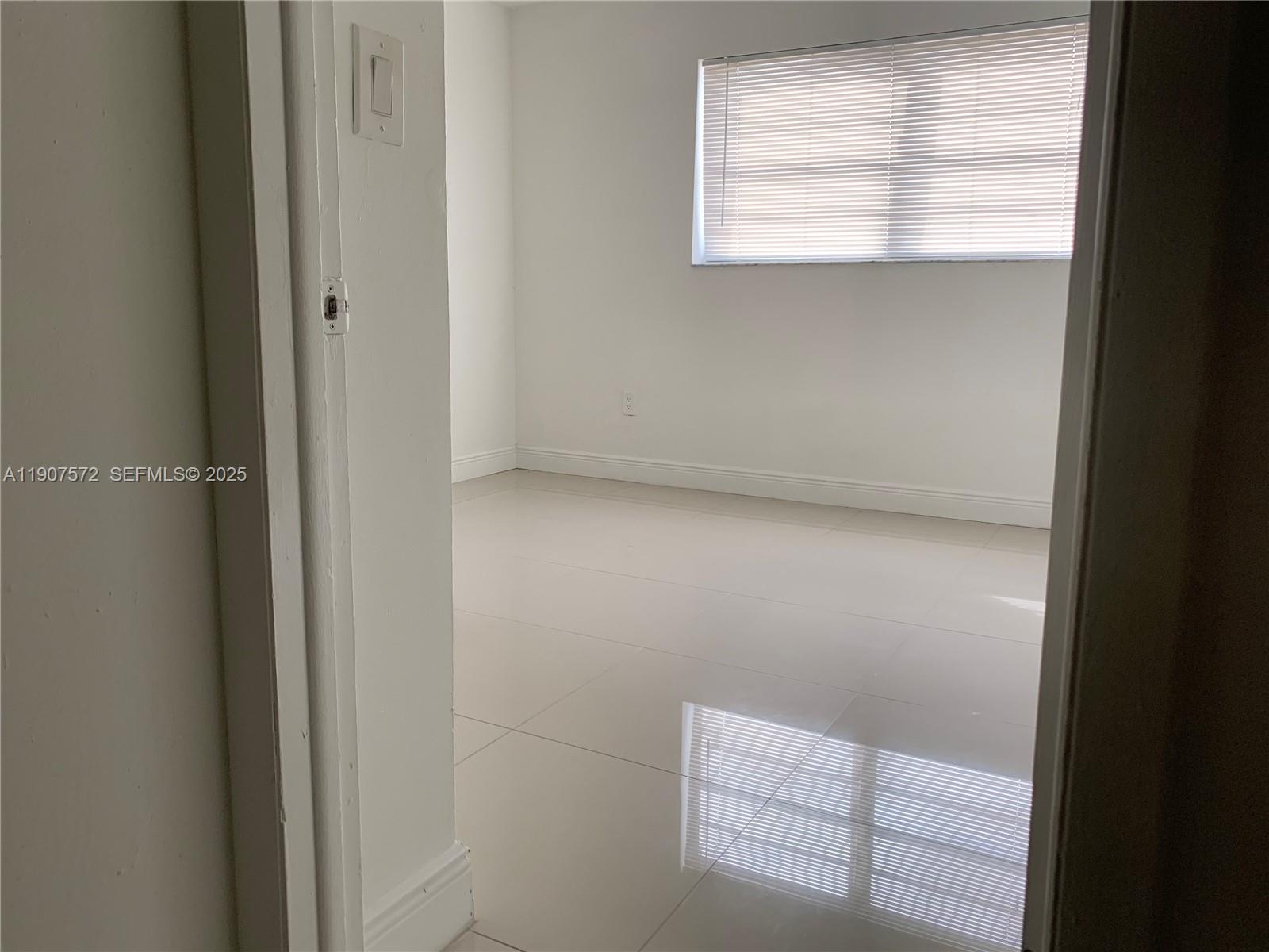 15102 Southwest 81st Street, Unit 113 Miami, FL 33193 - Photo 9 of 10 a view of window