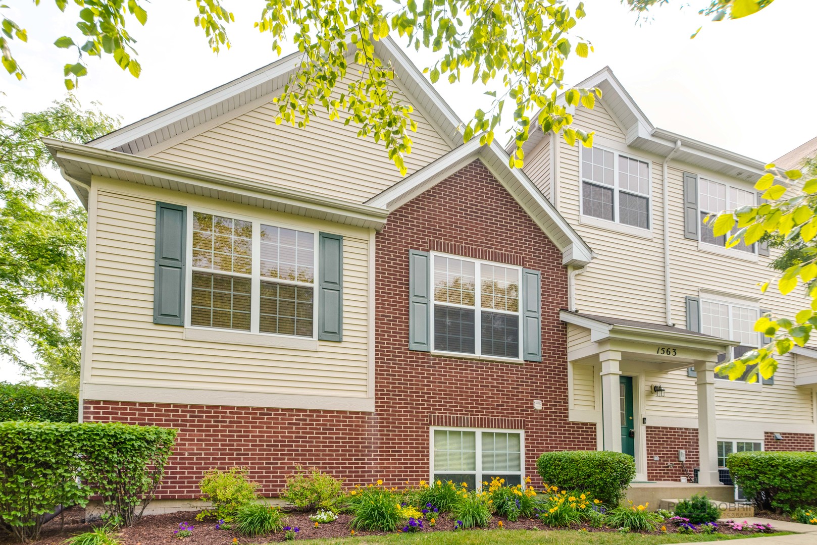 1563 West Turtle Creek Lane Round Lake, IL 60073 - Photo 1 of 24 a front view of a house