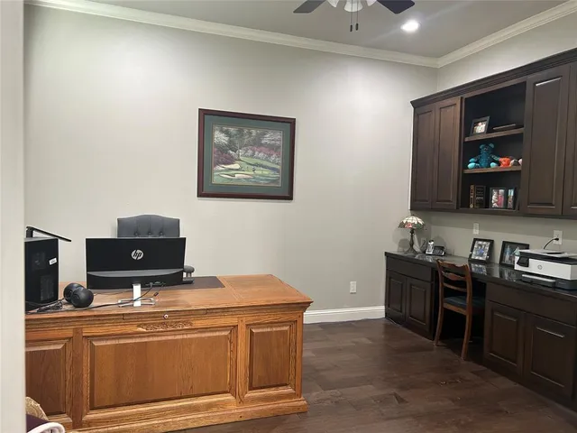 a room with furniture and flat screen tv