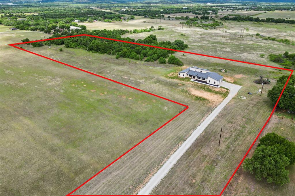 700 Brown Road Palo Pinto, TX 76484 - Photo 2 of 40 Aerial view featuring lot lines