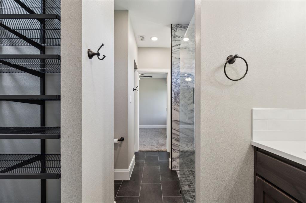 700 Brown Road Palo Pinto, TX 76484 - Photo 32 of 40 Jack and Jill bathroom with walk in shower