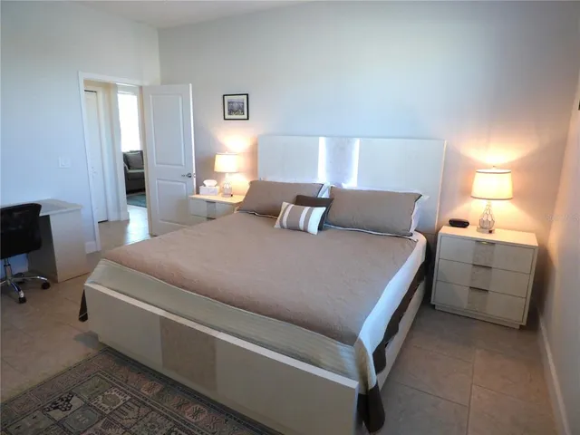 a bathroom with a granite countertop double vanity sinks and a mirror