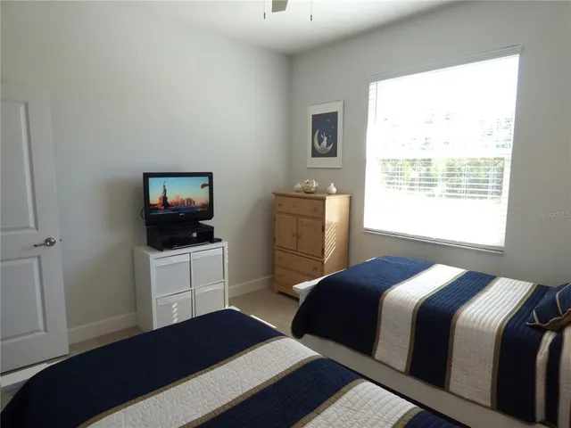 a bathroom with a toilet and a bathtub