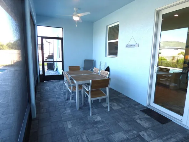 a view of swimming pool from a window