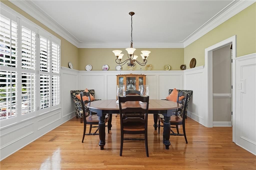 208 North Ridgeview Court Canton, GA 30115 - Photo 12 of 59 a view of a dining room with furniture window and wooden floor