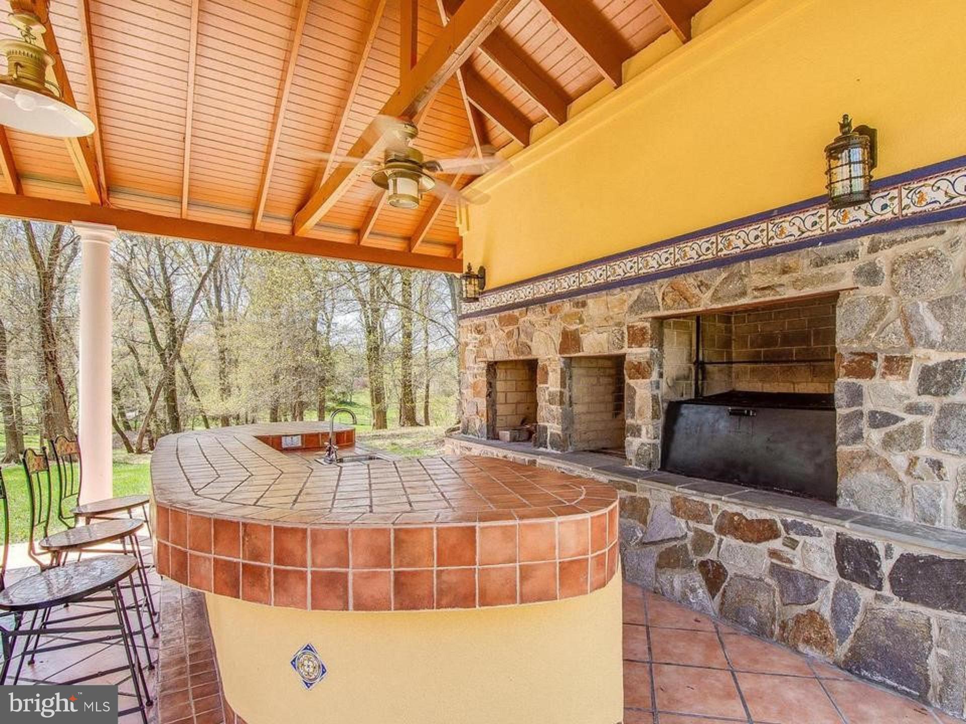 13610 Query Mill Road North Potomac, MD 20878 - Photo 49 of 60 Pavilion with outdoor kitchen and bar