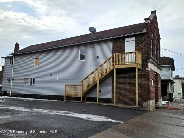 a front view of a house with a garage