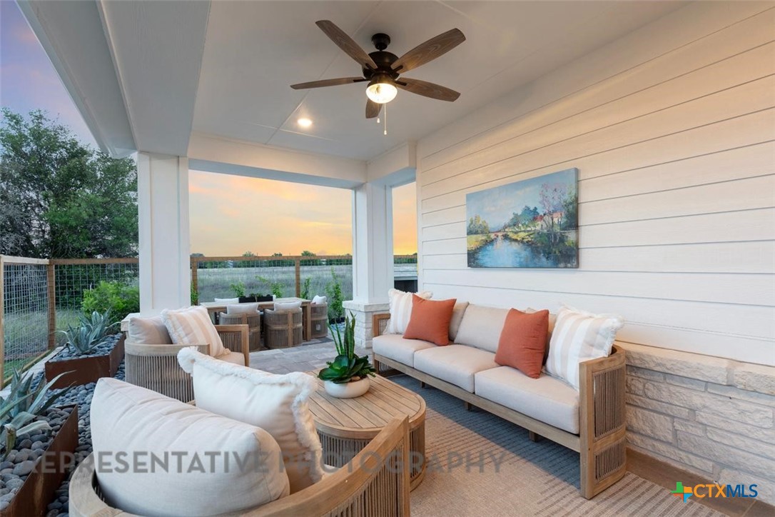 8084 Coral Draw Schertz, TX 78154 - Photo 8 of 13 a outdoor living space with furniture and a couch