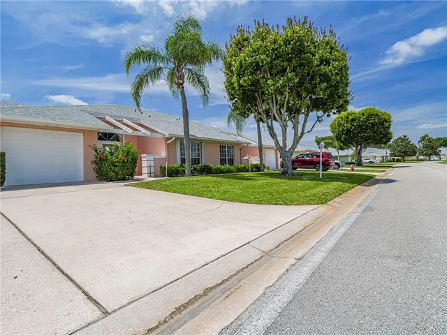 a house with garden in front of it
