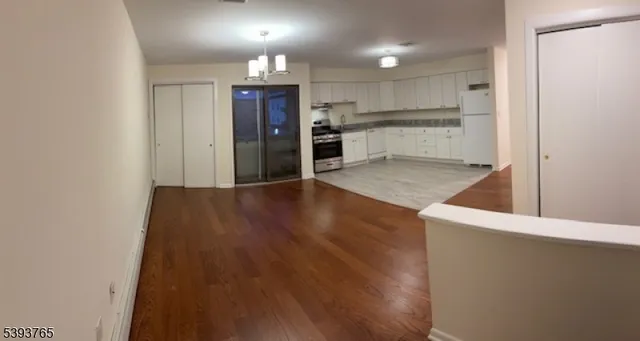 a view of kitchen with wooden floor
