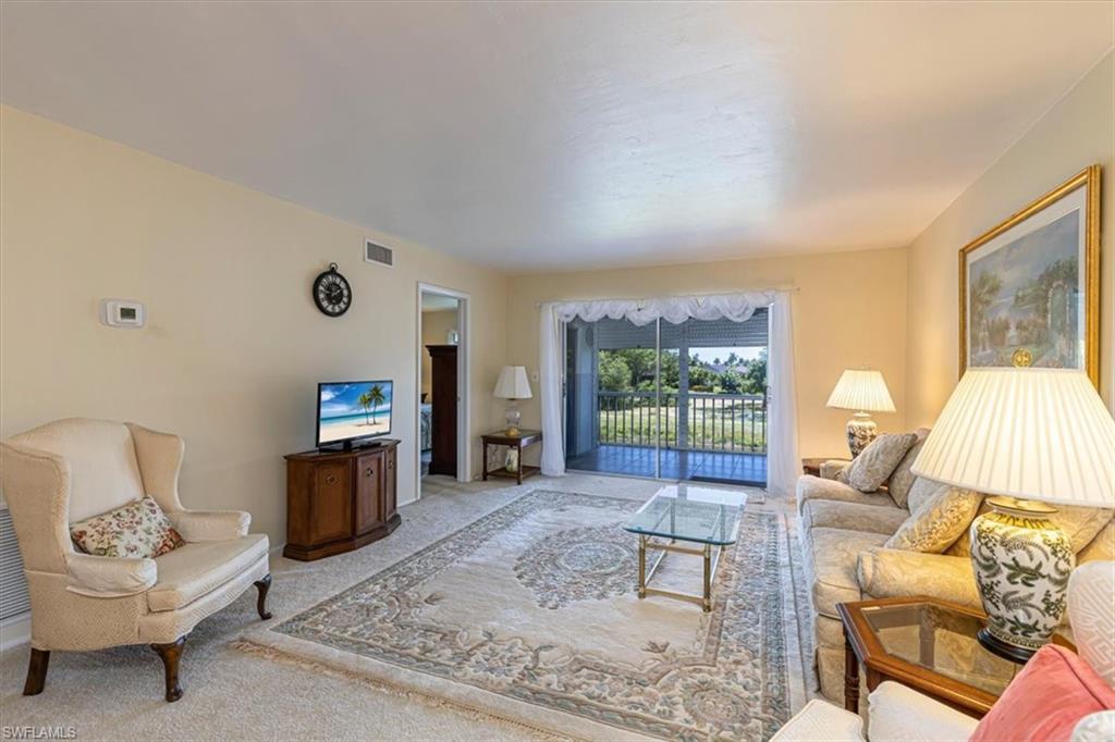 5483 Rattlesnake Hammock Road, Unit B201 Naples, FL 34113 - Photo 5 of 22
