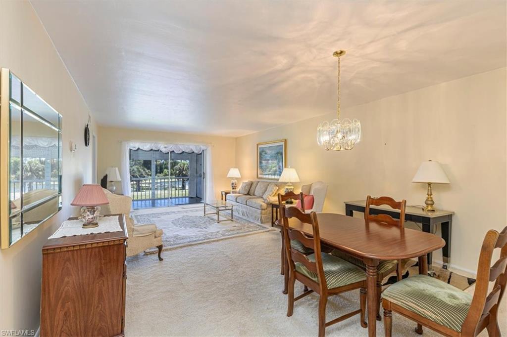 5483 Rattlesnake Hammock Road, Unit B201 Naples, FL 34113 - Photo 7 of 22
