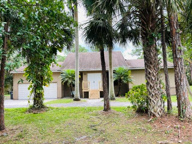 9296 166th Way North Jupiter, FL 33478 - Photo 2 of 23 IMG_4460