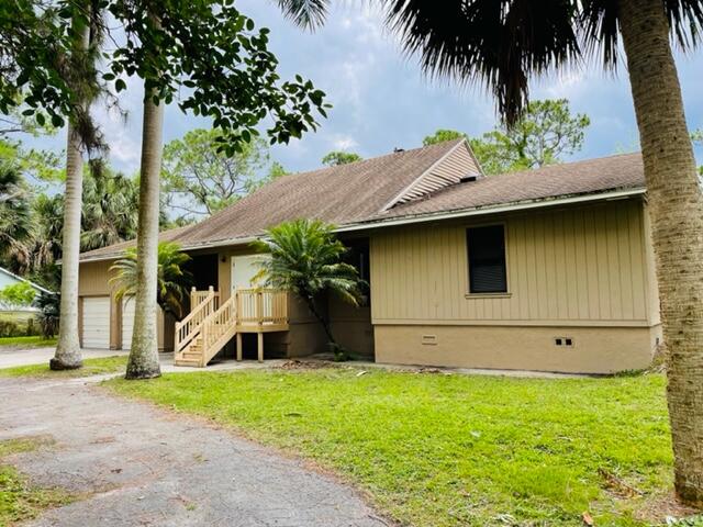 9296 166th Way North Jupiter, FL 33478 - Photo 3 of 23 IMG_4461