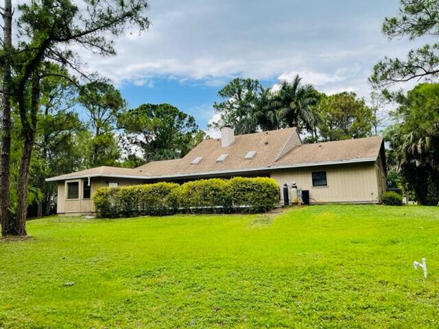 9296 166th Way North Jupiter, FL 33478 - Photo 5 of 23 IMG_4464