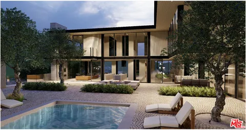 a view of a house with backyard and porch