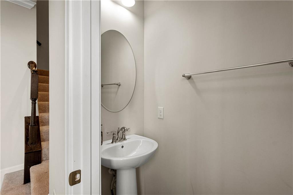 152-160 Cole Drive McKees Rocks, PA 15136 - Photo 7 of 39 a bathroom with a sink and mirror with toilet