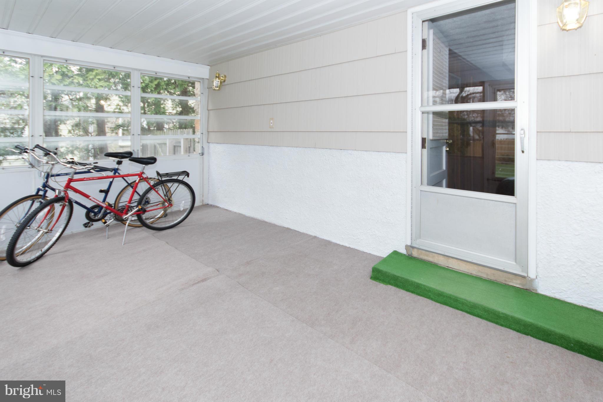 213 Garden Road Baltimore, MD 21286 - Photo 22 of 30 Glassed-in porch