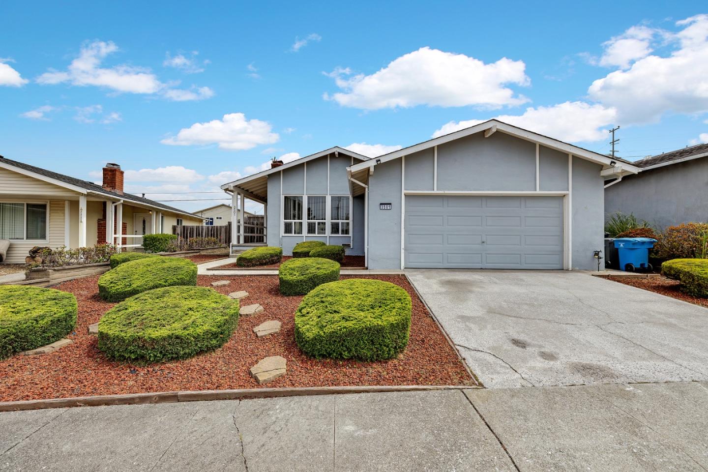 3501 Longview Drive San Bruno, CA 94066 - Photo 1 of 1 a front view of a house with a yard and garage