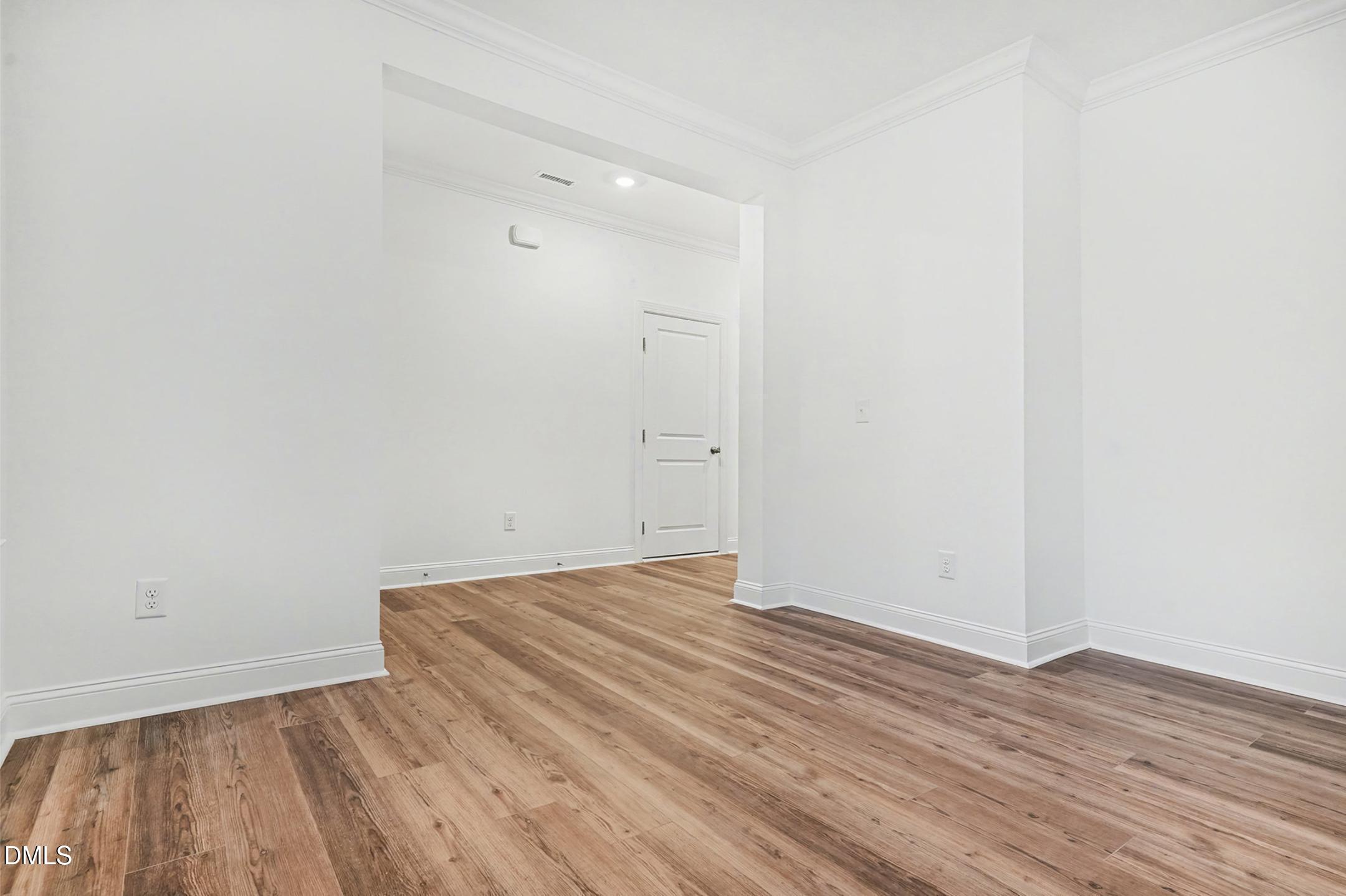1328 Hazelnut Ridge Lane Knightdale, NC 27545 - Photo 20 of 50 a view of room with wooden floor