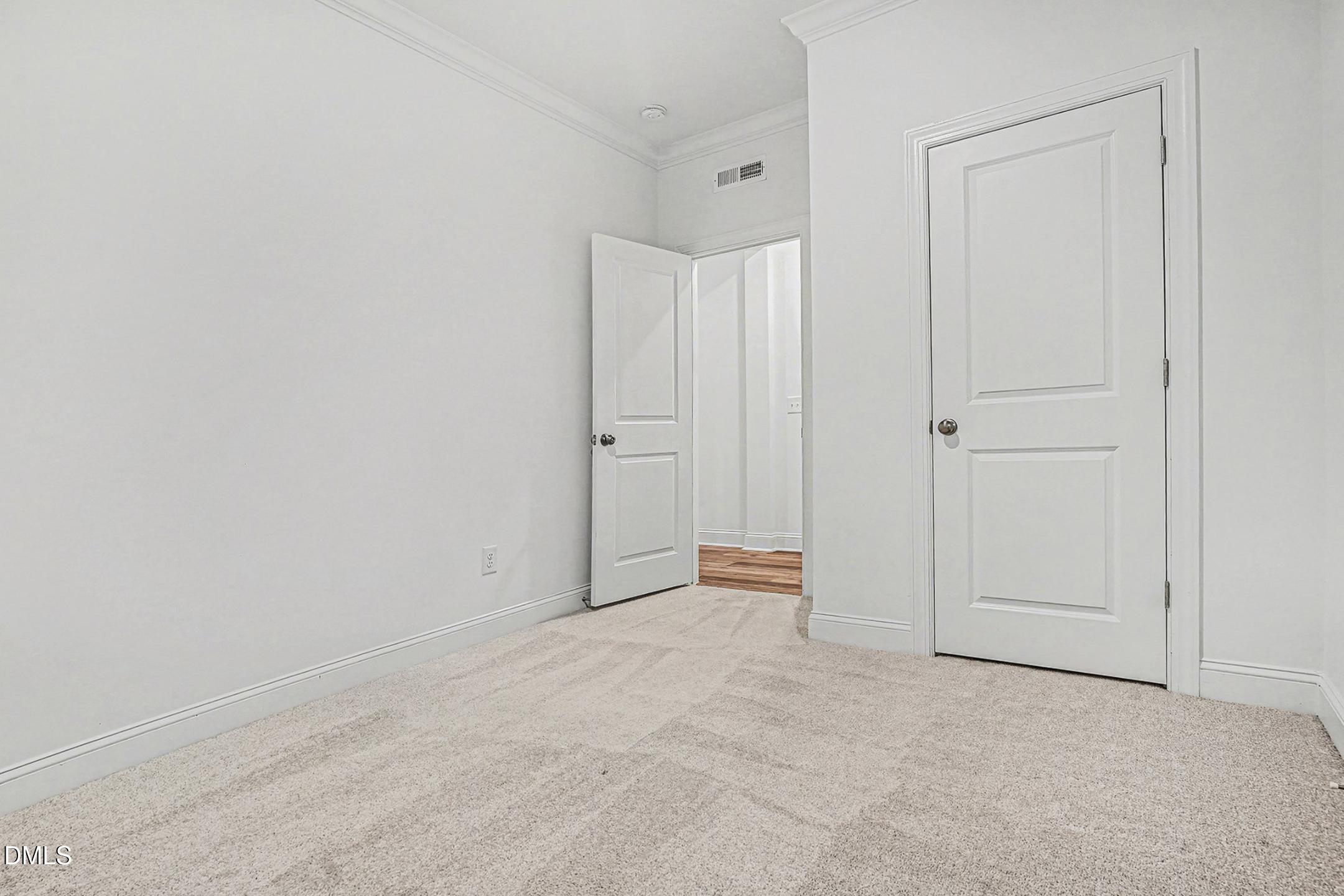 1328 Hazelnut Ridge Lane Knightdale, NC 27545 - Photo 30 of 50 a view of an empty room