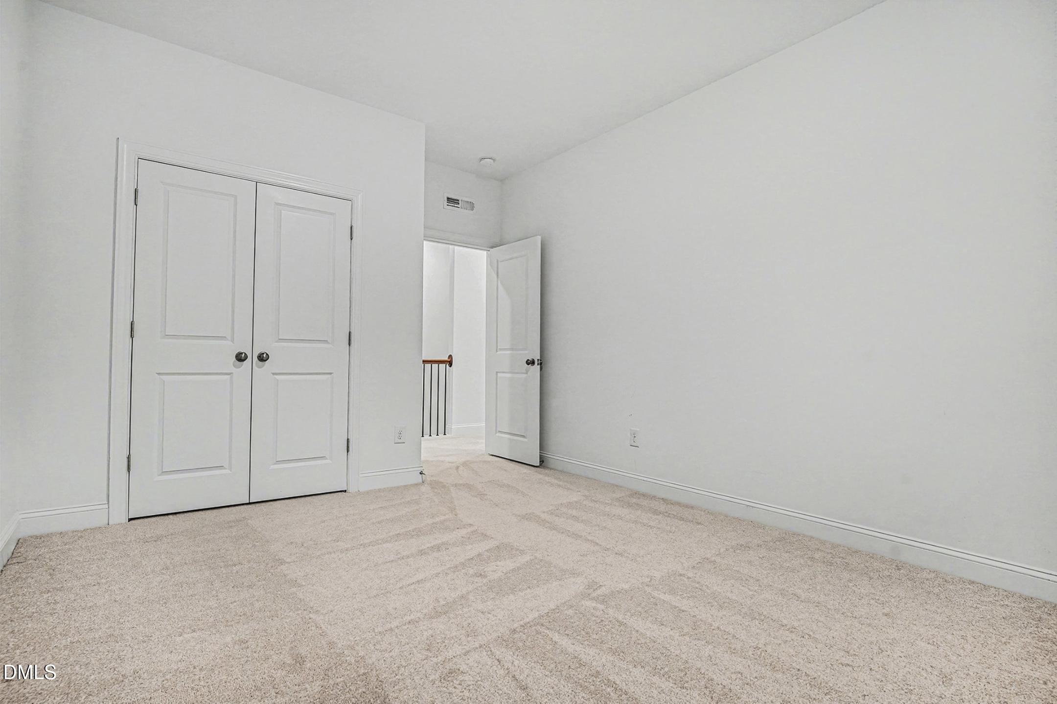 1328 Hazelnut Ridge Lane Knightdale, NC 27545 - Photo 33 of 50 a view of an empty room