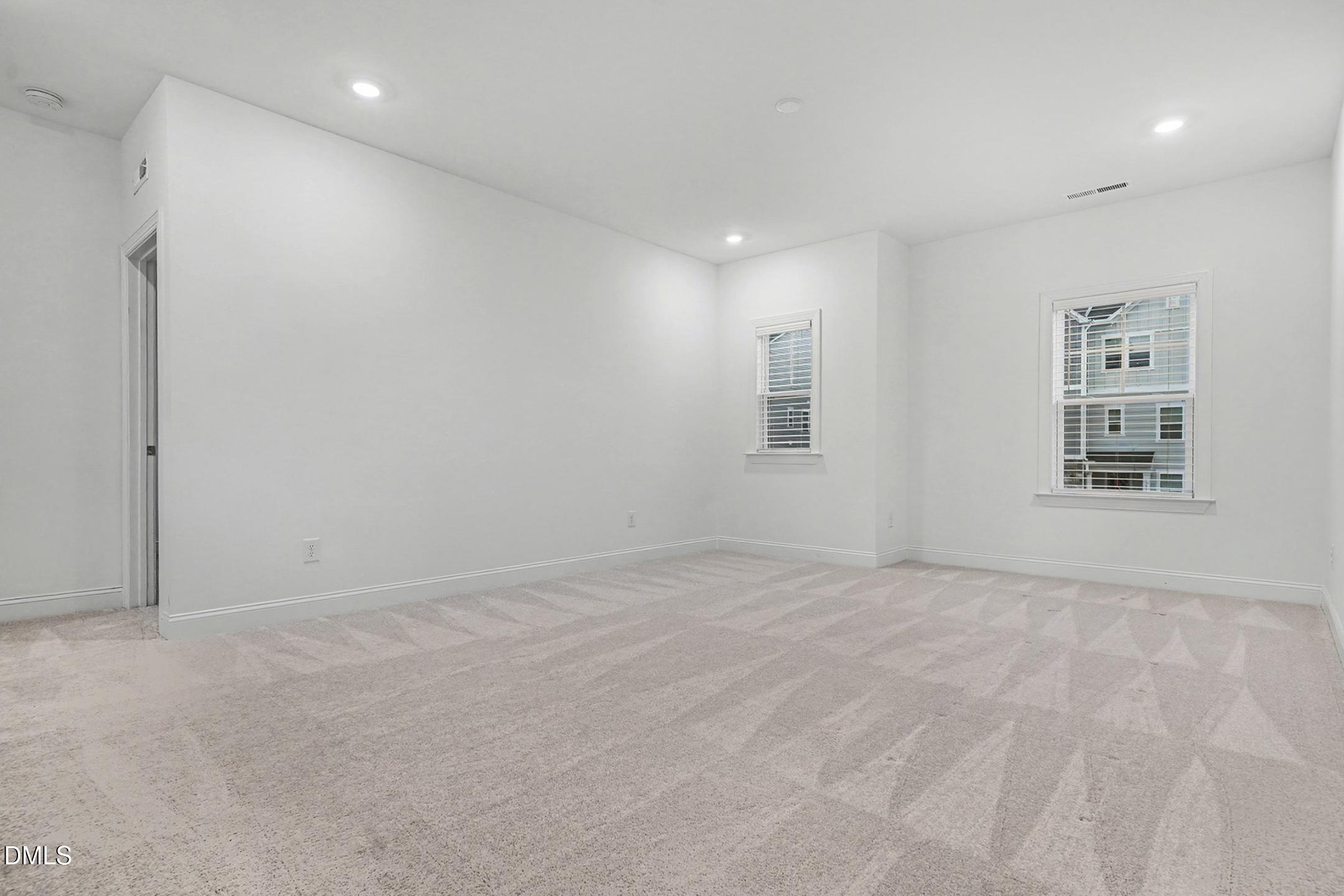 1328 Hazelnut Ridge Lane Knightdale, NC 27545 - Photo 34 of 50 a view of an empty room with a window