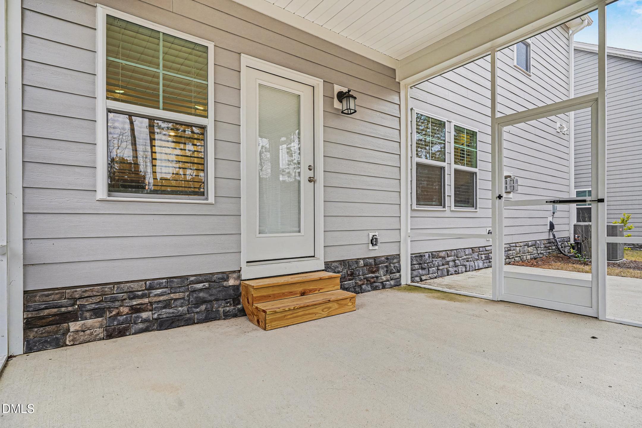 1328 Hazelnut Ridge Lane Knightdale, NC 27545 - Photo 42 of 50 an empty room with windows