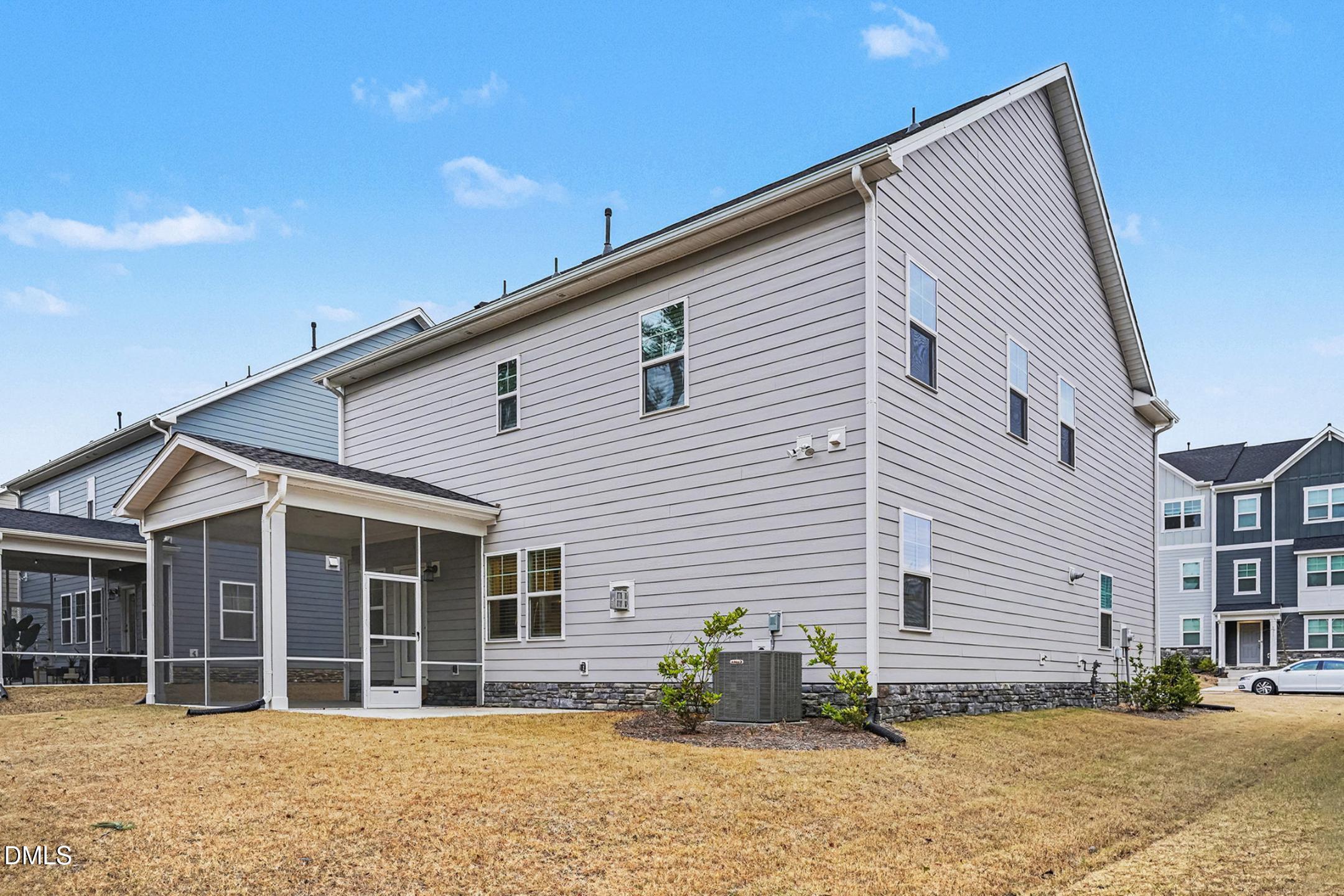 1328 Hazelnut Ridge Lane Knightdale, NC 27545 - Photo 45 of 50 a view of a house with a patio