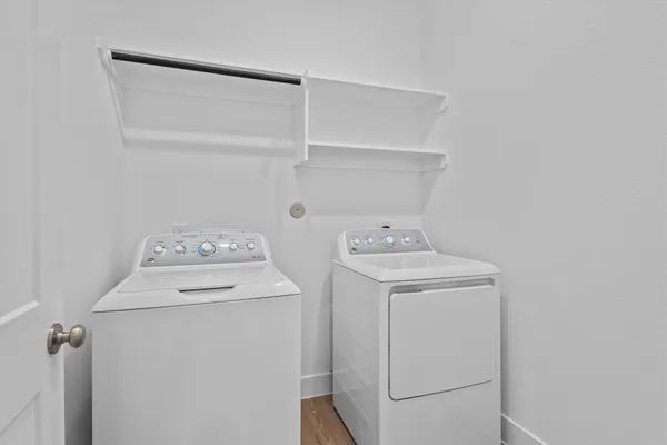 a utility room with dryer and washer