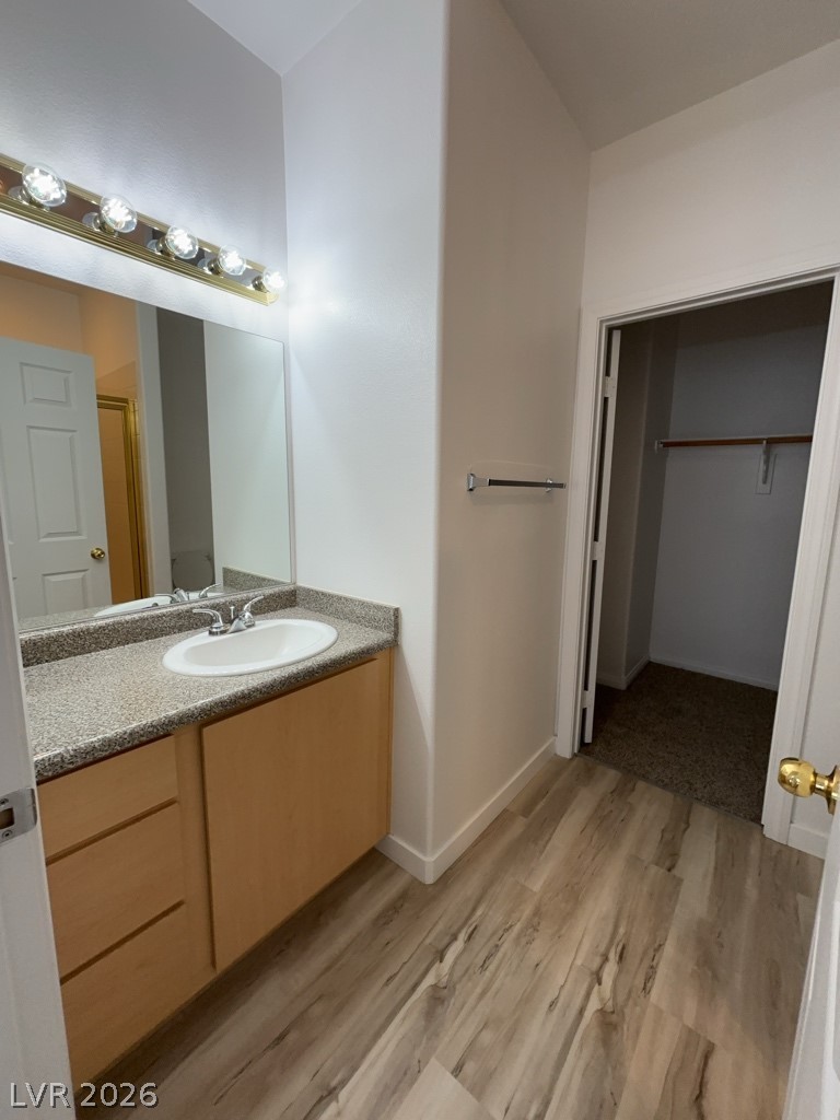 4915 East Russell Road, Unit 143 Las Vegas, NV 89120 - Photo 9 of 10 A streamlined vanity with practical storage complements the easy-care flooring in this essential bathroom space.