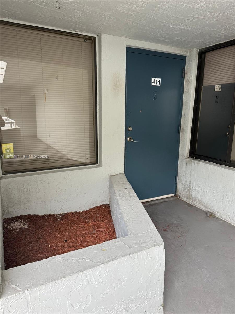 8205 Southwest 152nd Avenue, Unit F414 Miami, FL 33193 - Photo 11 of 13 a view of hallway