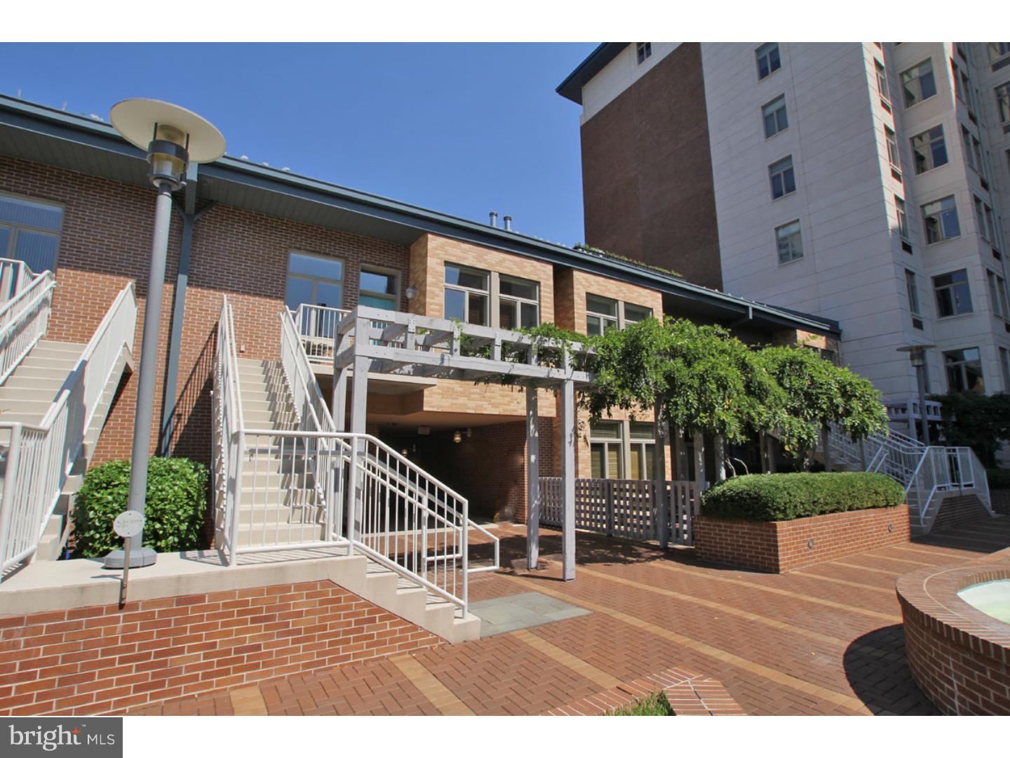 a view of a house with backyard and porch