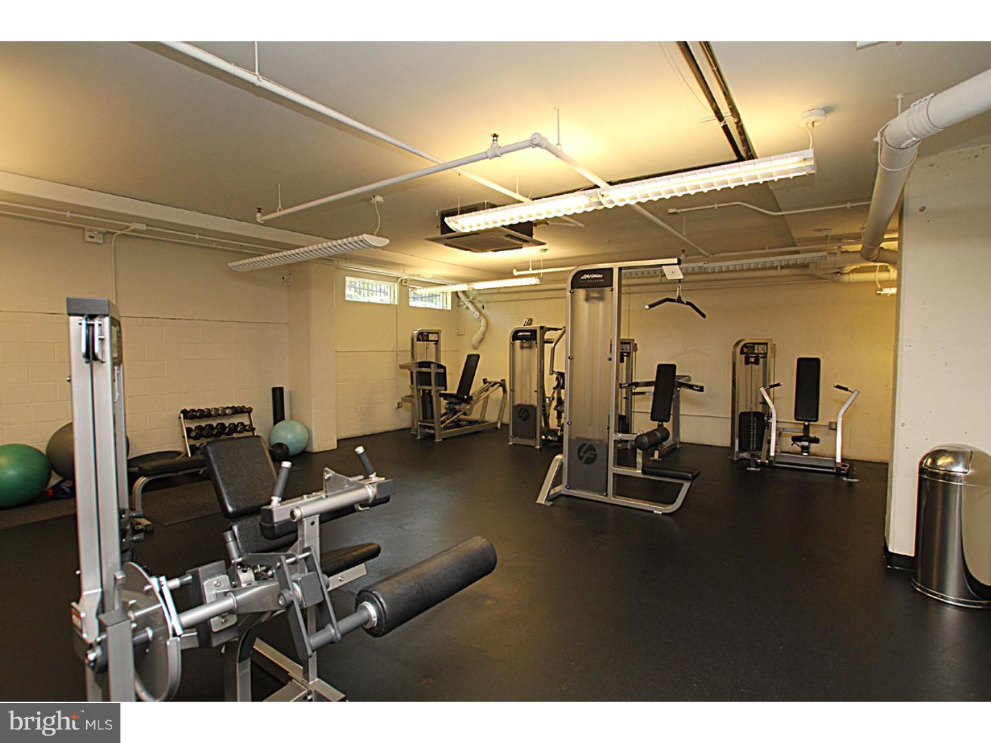 1900 Hamilton Street, Unit D19 Philadelphia, PA 19130 - Photo 23 of 25 a view of a room with gym equipment