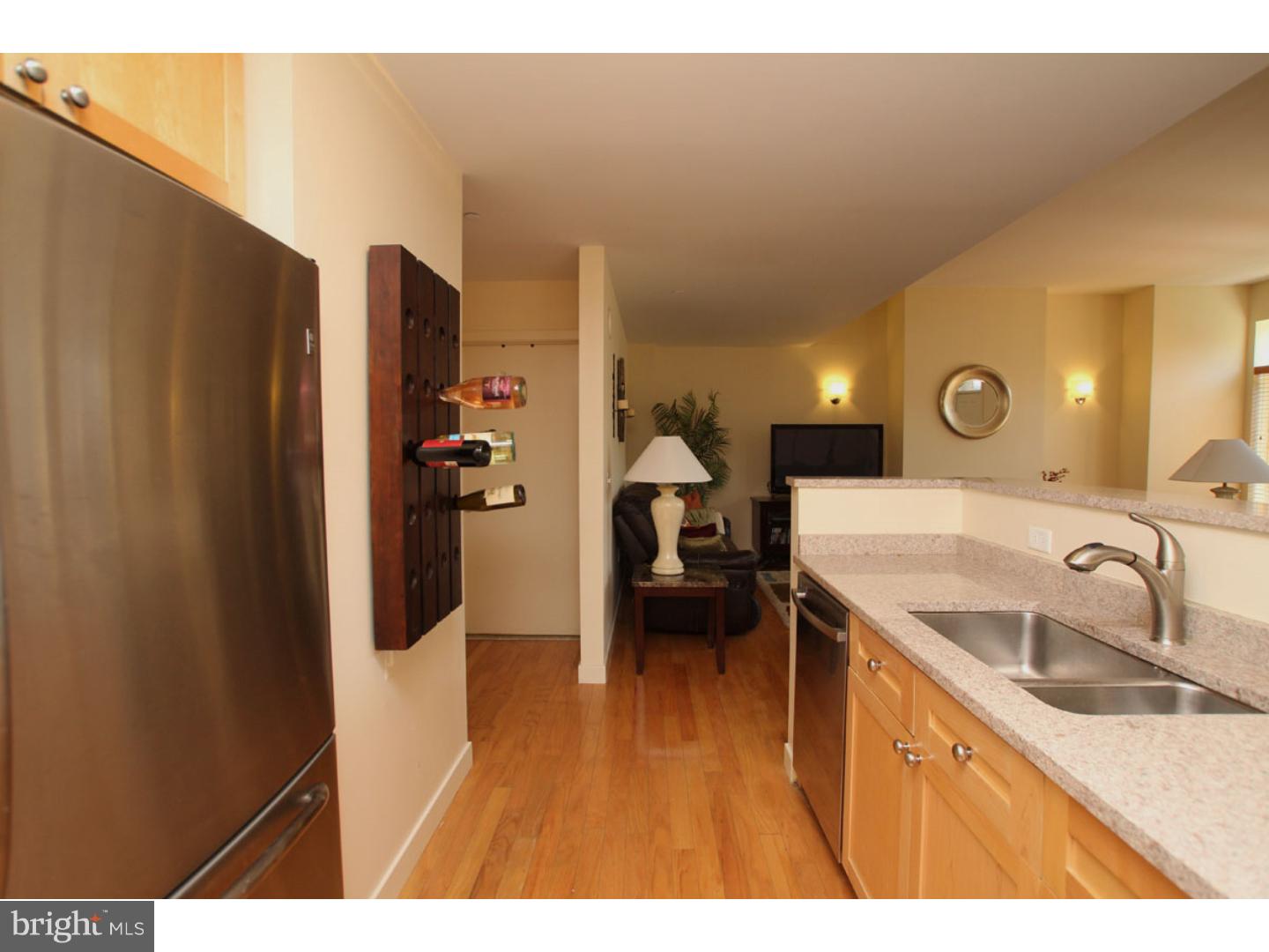 1900 Hamilton Street, Unit D19 Philadelphia, PA 19130 - Photo 10 of 25 a bathroom with a sink and a mirror