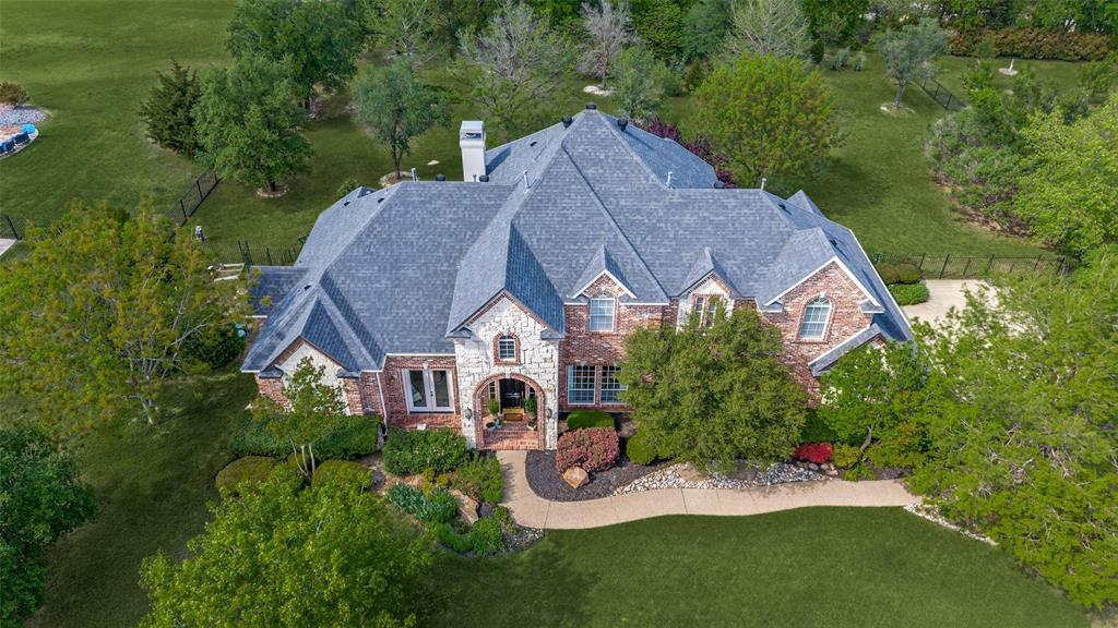 a aerial view of a house with garden