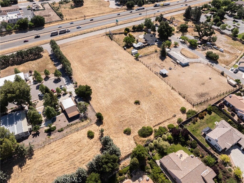 2400 Ramona Road Atascadero, CA 93422 - Photo 19 of 27 an aerial view of a house with a yard and trees