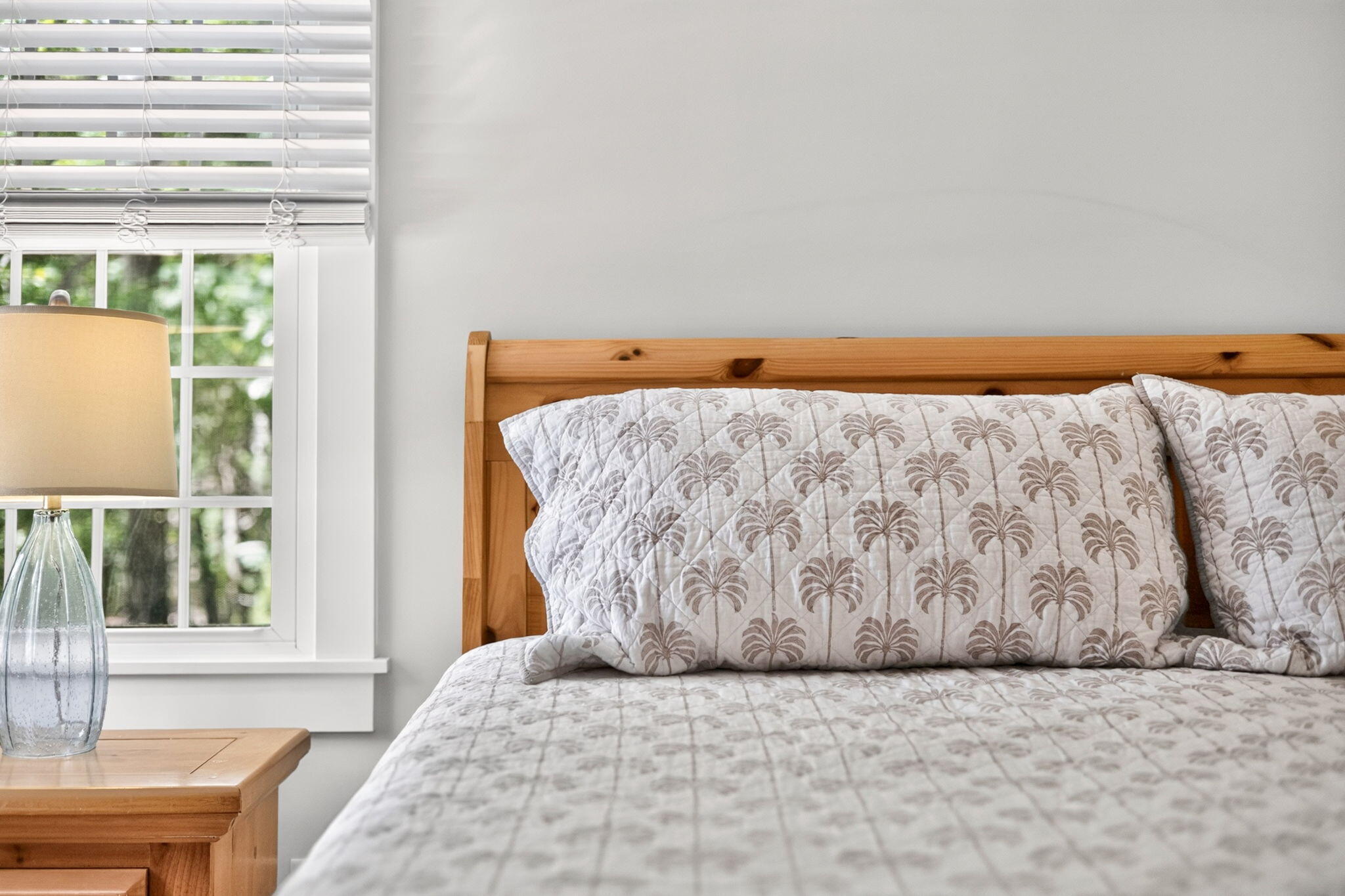 35 Debs Hill Road, Unit 35 Yarmouth Port, MA 02675 - Photo 12 of 36 a bed sitting in a bedroom next to a window