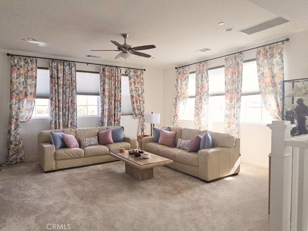 13952 Lily Lane Riverside, CA 92503 - Photo 20 of 42 a living room with furniture and a large window