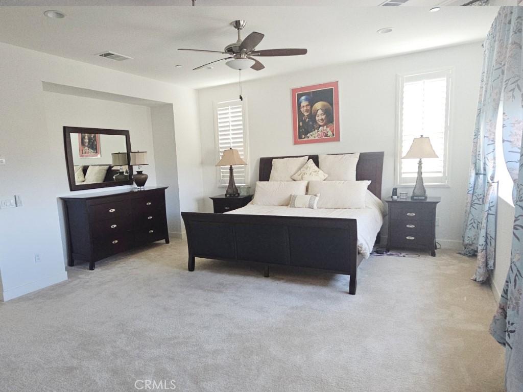 13952 Lily Lane Riverside, CA 92503 - Photo 27 of 42 a living room with furniture and a lamp