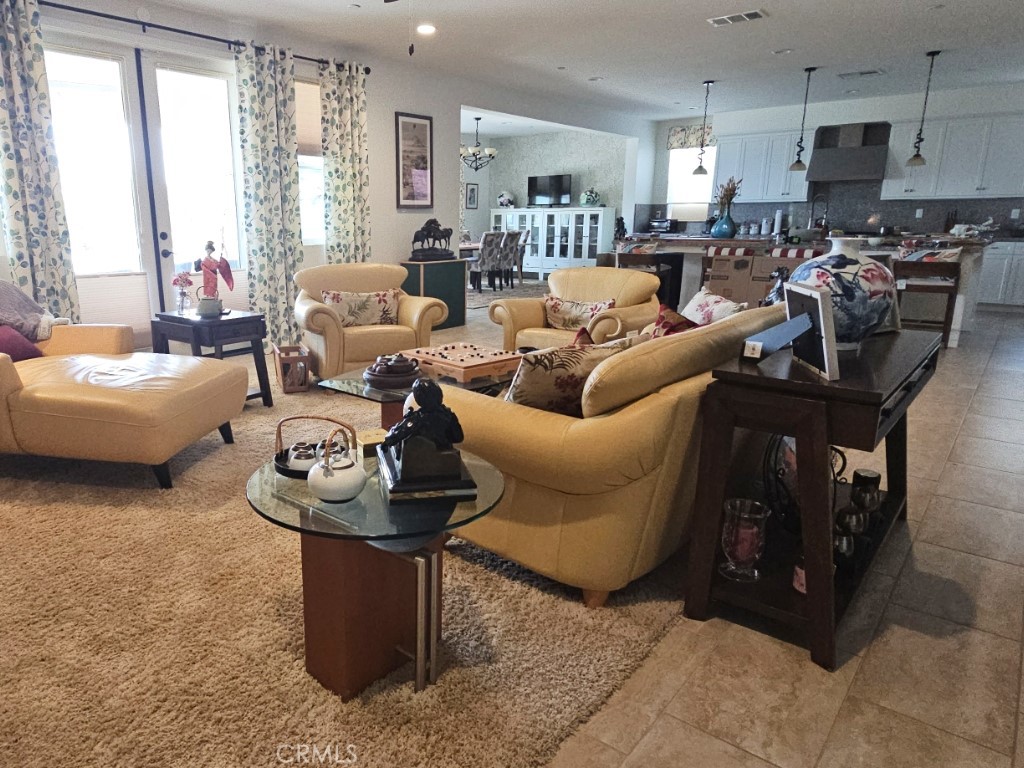 13952 Lily Lane Riverside, CA 92503 - Photo 7 of 42 a living room with furniture and a large window