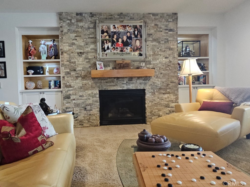 13952 Lily Lane Riverside, CA 92503 - Photo 10 of 42 a living room with furniture and a fireplace