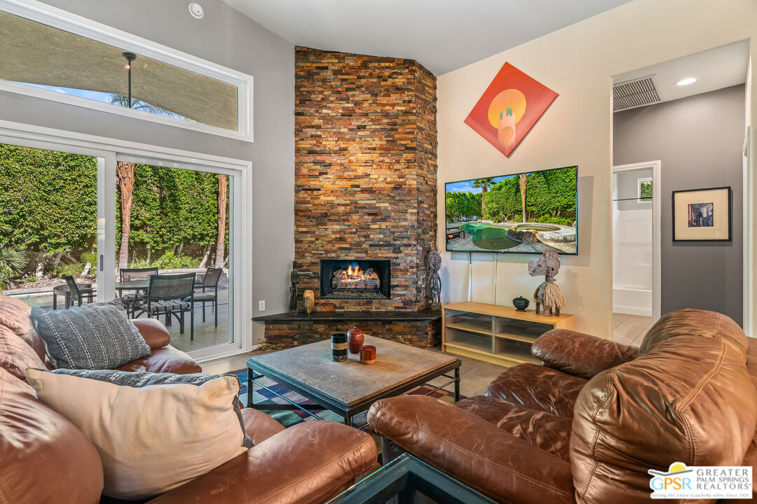 67860 Ontina Road Cathedral City, CA 92234 - Photo 17 of 48 a living room with furniture and a flat screen tv