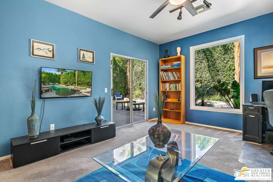 67860 Ontina Road Cathedral City, CA 92234 - Photo 26 of 48 a living room with furniture window and wooden floor