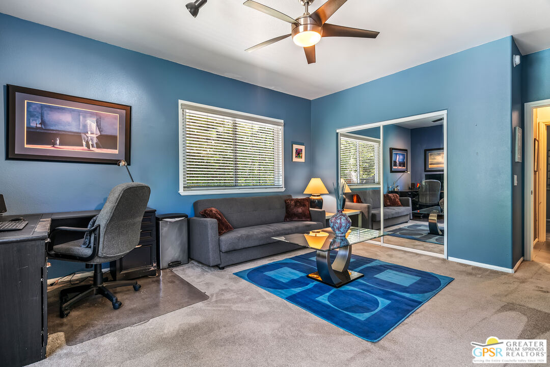 67860 Ontina Road Cathedral City, CA 92234 - Photo 27 of 48 a living room with furniture and a window