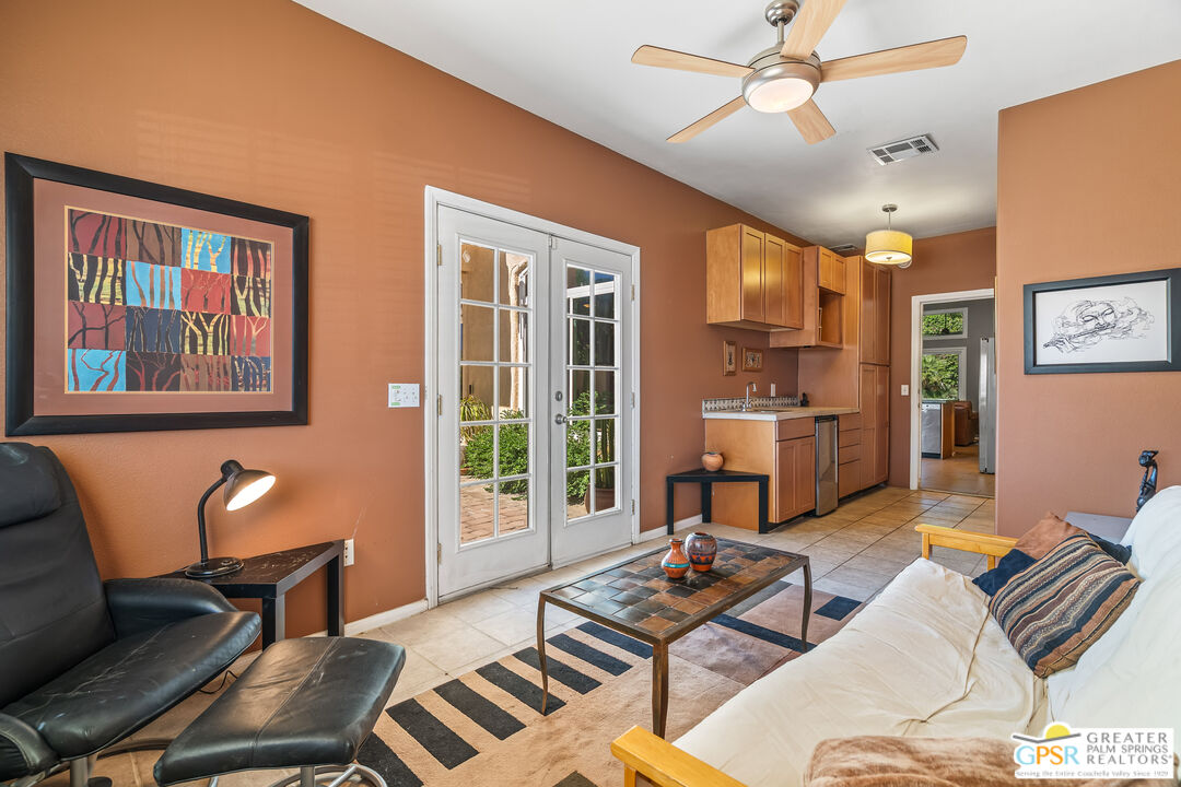 67860 Ontina Road Cathedral City, CA 92234 - Photo 32 of 48 a living room with furniture and a window