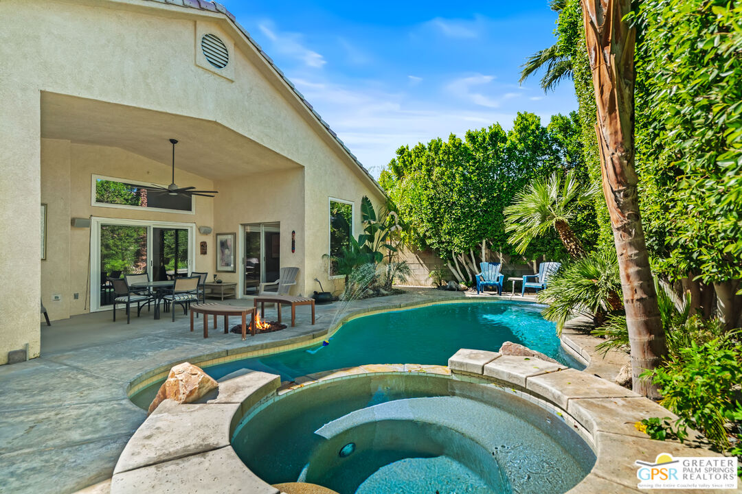 67860 Ontina Road Cathedral City, CA 92234 - Photo 38 of 48 a view of a house with backyard porch and sitting area
